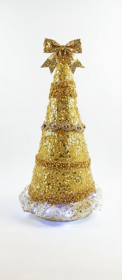 Decorative gold Christmas tree with a glowing base gold rhinestones  and decor